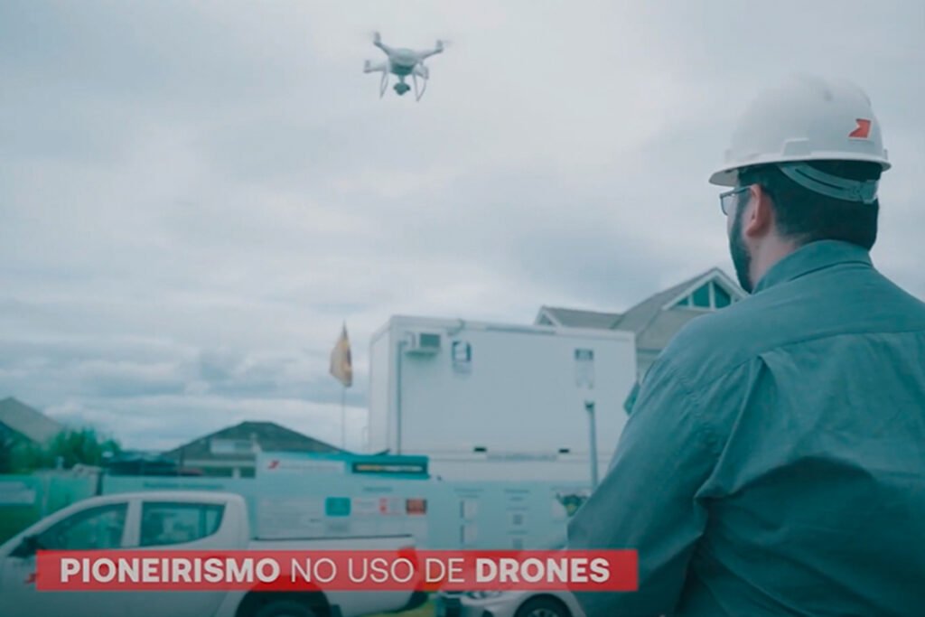 Male engineer monitoring construction site with drone - Technolo